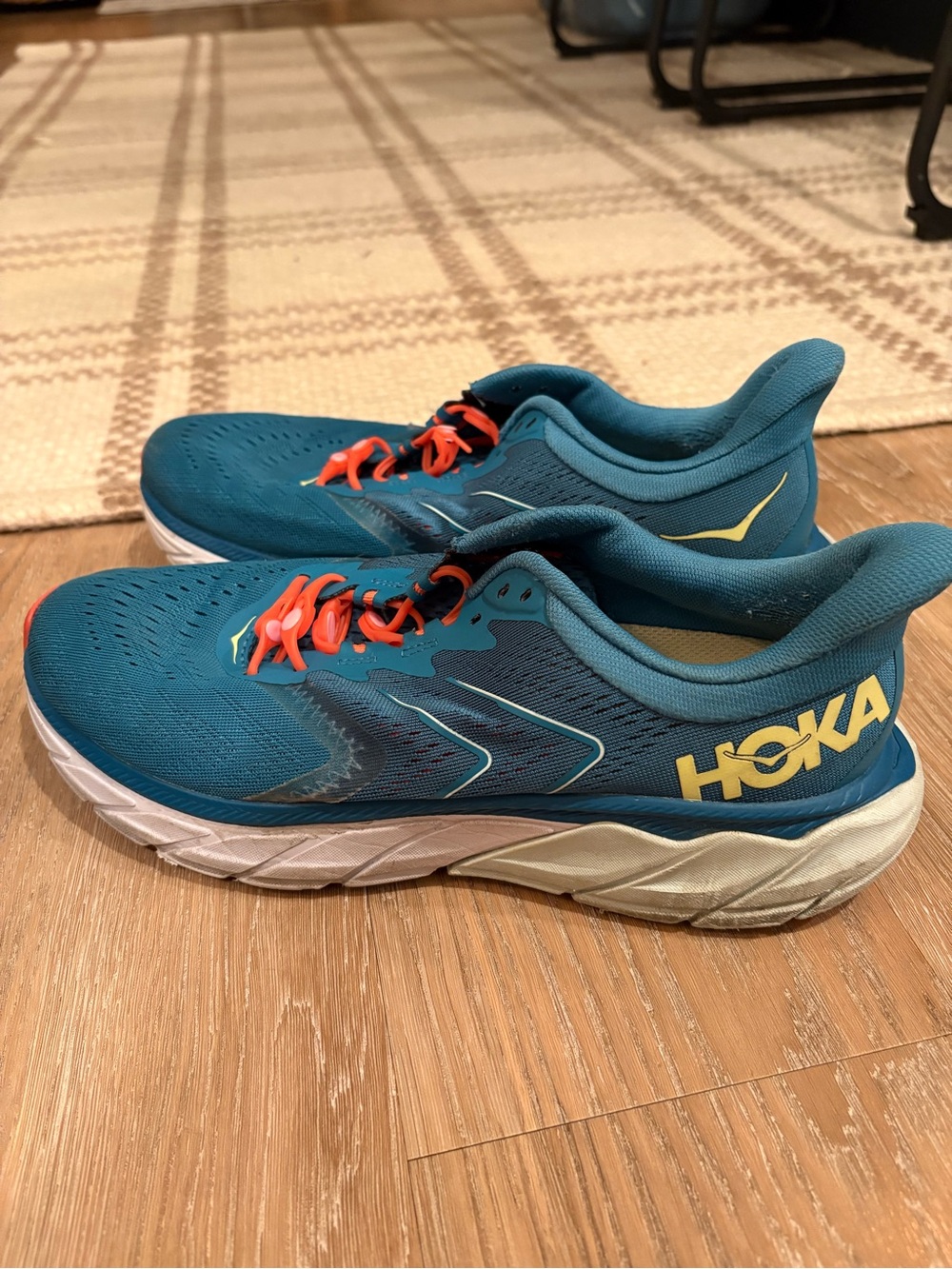 Hoka Men’s Teal Athletic Shoes with Yellow Accents and Orange Laces